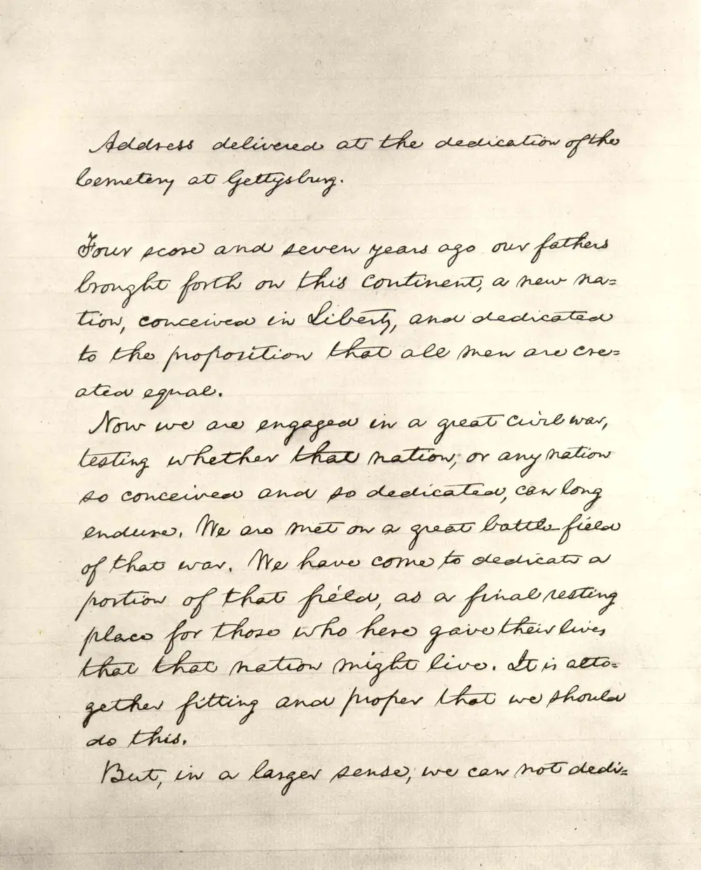 A scanned handwritten page of the Gettysburg Address on lined paper.